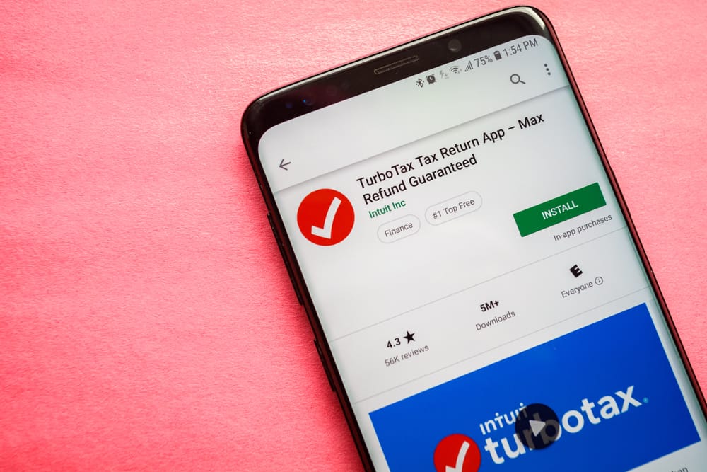 Virginia, USA - January 30, 2019: TurboTax Tax Return application on smartphone screen close-up Google Play Store install page to download app on Android.
